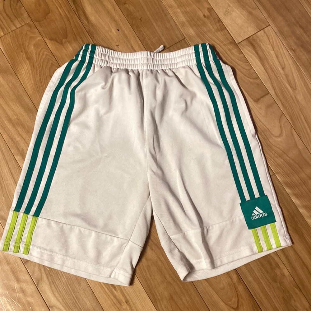 White & green adidas shorts size large in kids